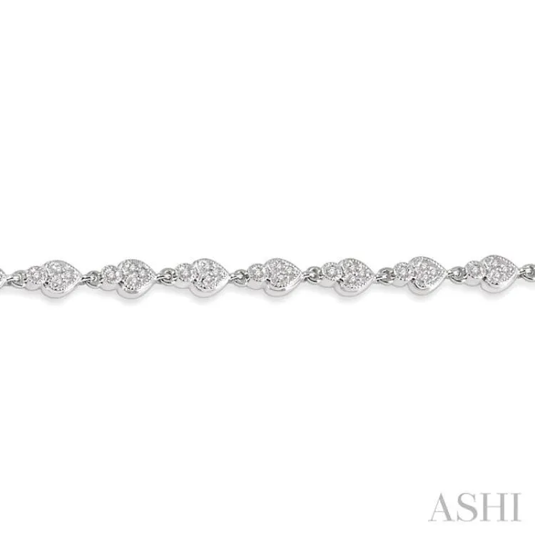 1/3 ctw Heart Charm Round Cut Diamond Link Bracelet in 10K White Gold