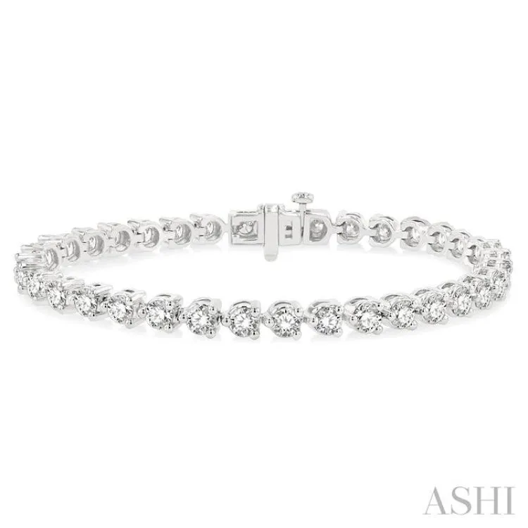 7 Ctw Tri-Prong Round Cut Diamond Bracelet in 14K White Gold