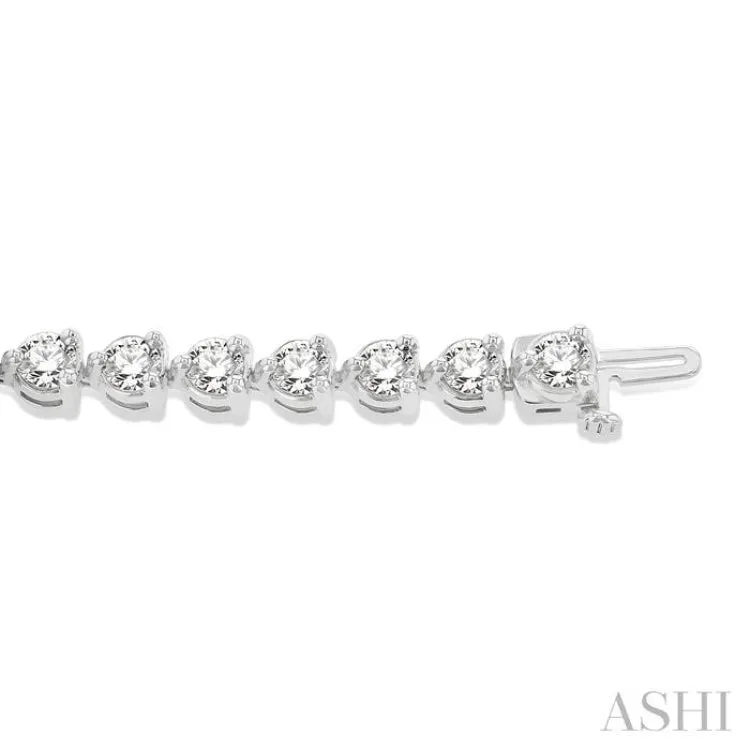 9.00CT RDDM 3 PRONG BRACELET WG 14K-G*