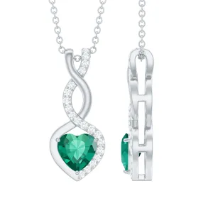 Lab Created Emerald and Diamond Infinity Heart Pendant